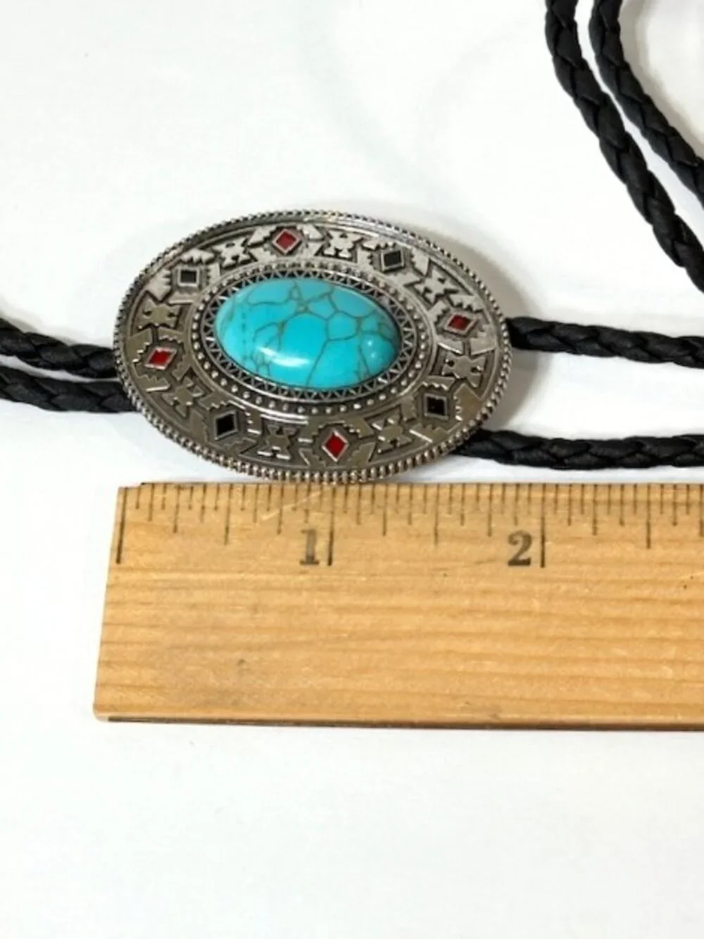 Turquoise-tone, silver-tone and black cord western cowboy bolo tie